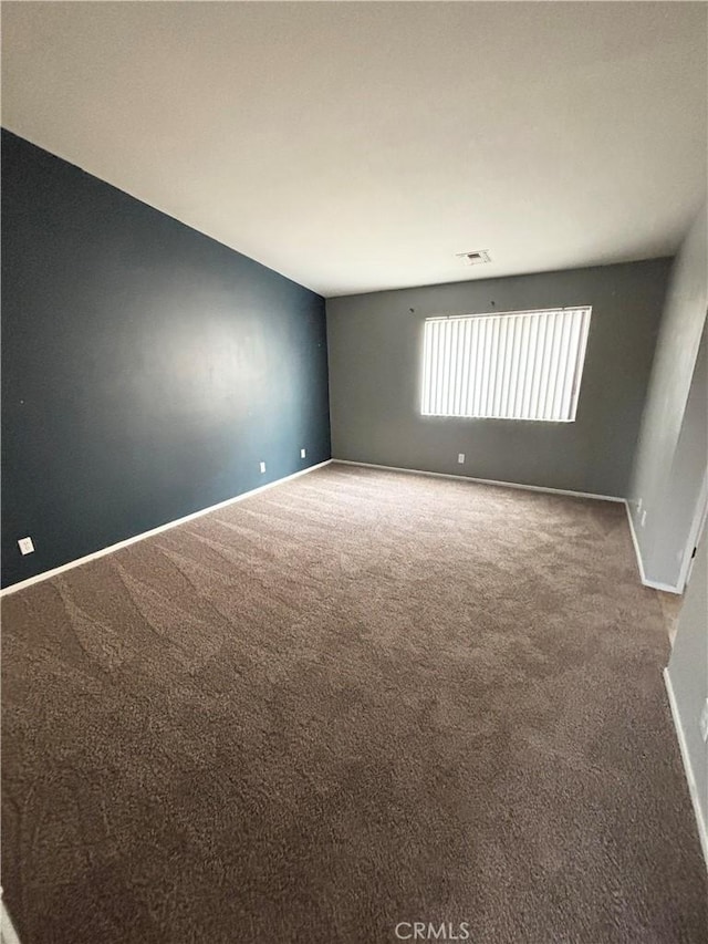 66263 6th St, Desert Hot Springs, CA 92240 - carpeted empty room featuring baseboards and visible vents