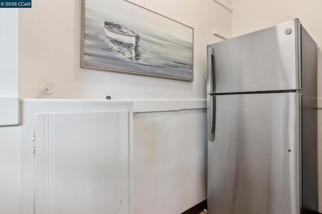 kitchen featuring stainless steel refrigerator