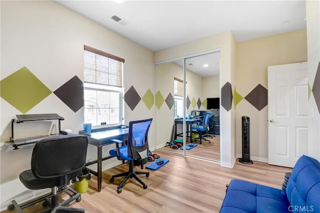 office space featuring light wood-type flooring