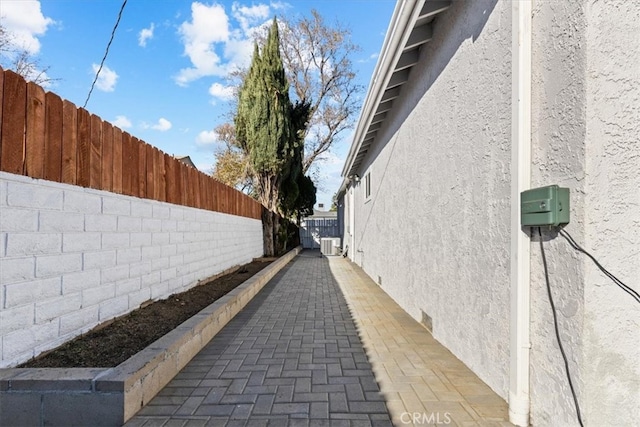 view of home's exterior with cooling unit