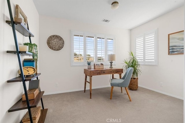 home office with light carpet