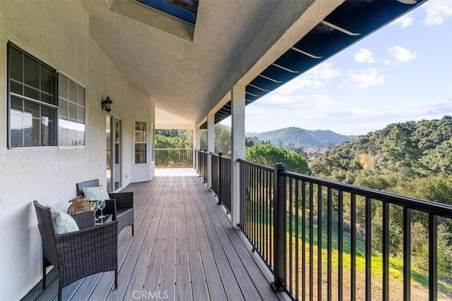 deck featuring a mountain view