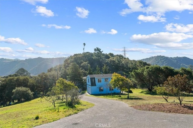 view of mountain feature featuring a rural view