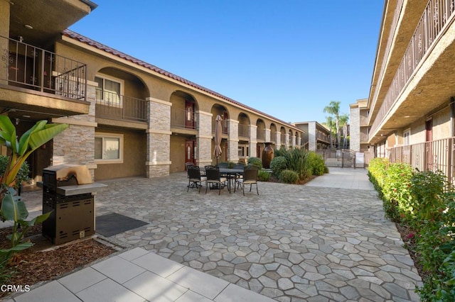 view of community with a patio