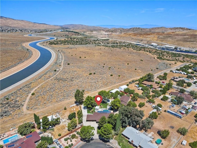 bird's eye view with a mountain view