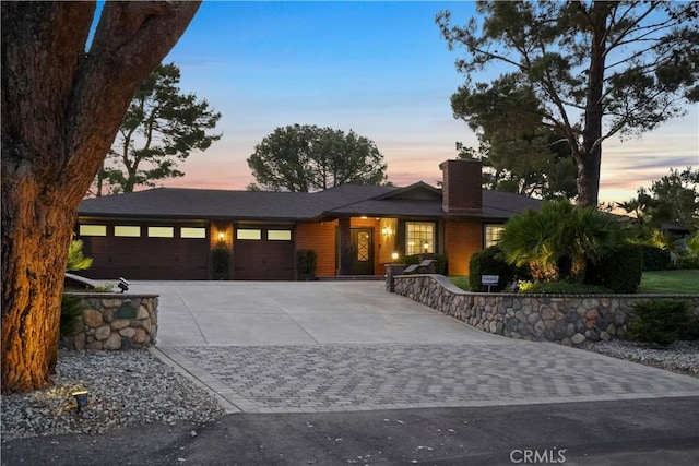 view of front of property with a garage