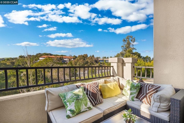 balcony with an outdoor hangout area