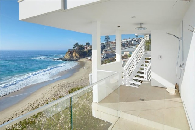 property view of water featuring a beach view