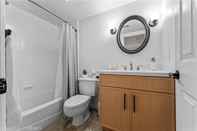 full bathroom with shower / tub combo, vanity, and toilet