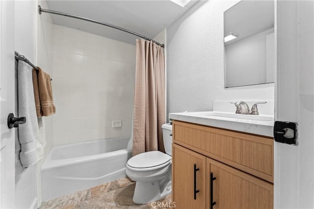 full bathroom with vanity, toilet, and shower / tub combo with curtain