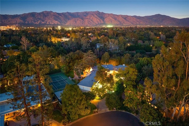 aerial view at dusk with a mountain view