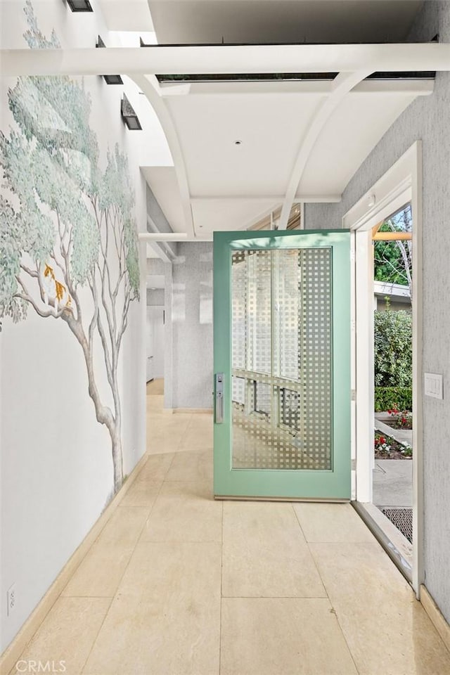 hallway with light tile patterned flooring