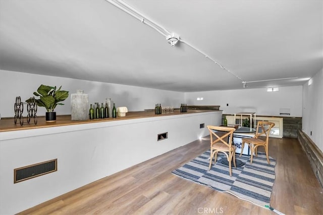 dining area featuring wood-type flooring