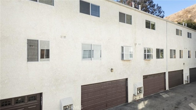 view of building exterior featuring a garage