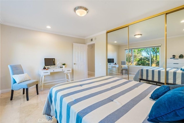 bedroom featuring a closet and crown molding