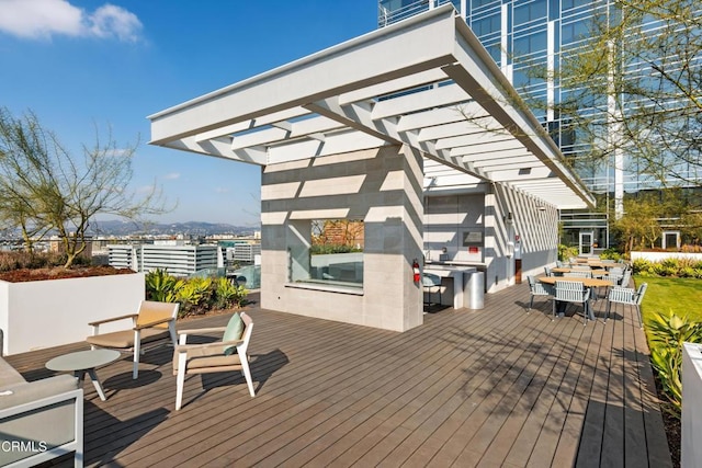 wooden deck with a pergola