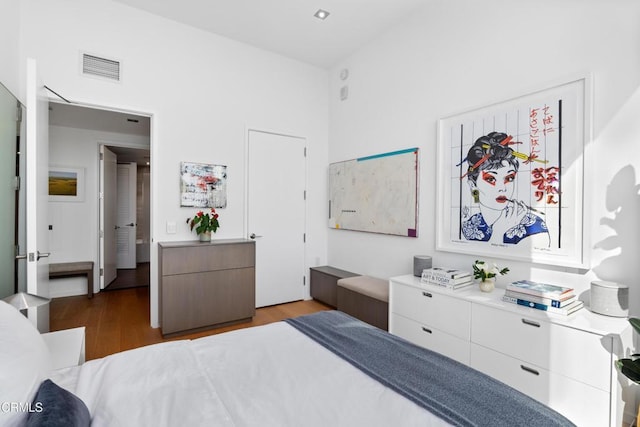 bedroom featuring dark wood-type flooring