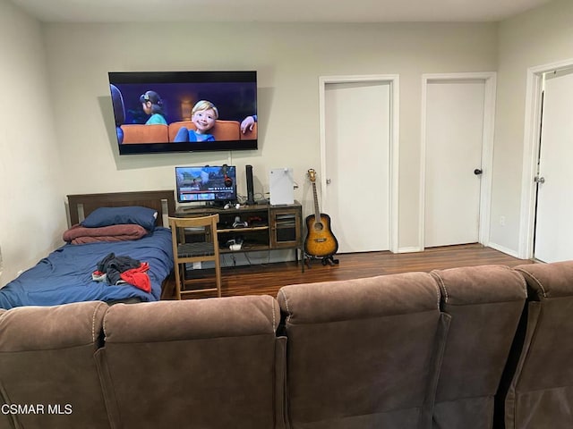 bedroom with hardwood / wood-style floors