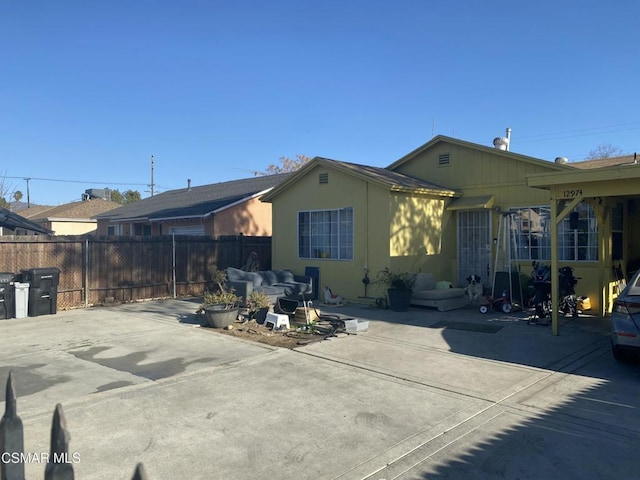 rear view of property with a patio