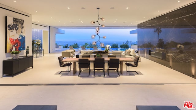 dining space with a chandelier