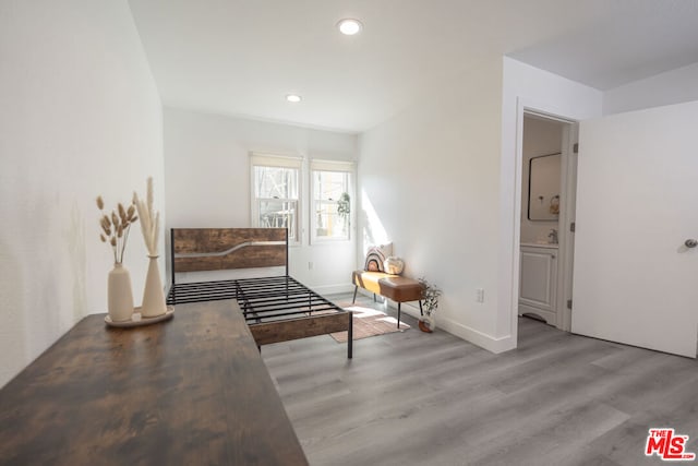 interior space with sink and light hardwood / wood-style floors