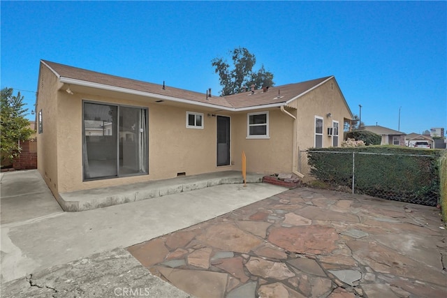 back of property featuring a patio area