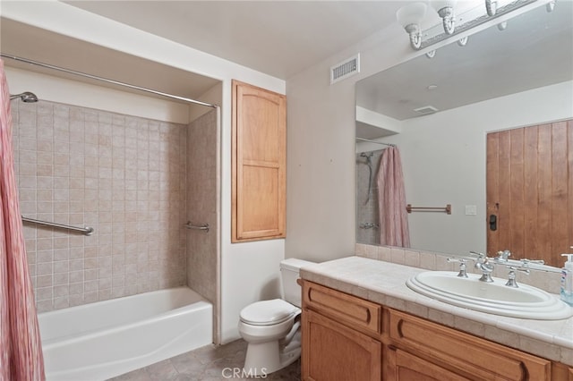 full bathroom featuring toilet, vanity, tile patterned flooring, and shower / bathtub combination with curtain