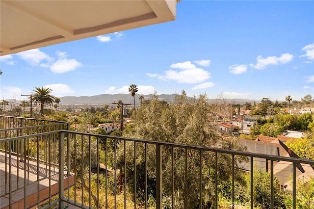 balcony featuring a mountain view