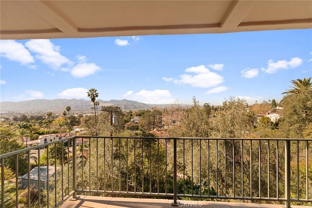 balcony featuring a mountain view