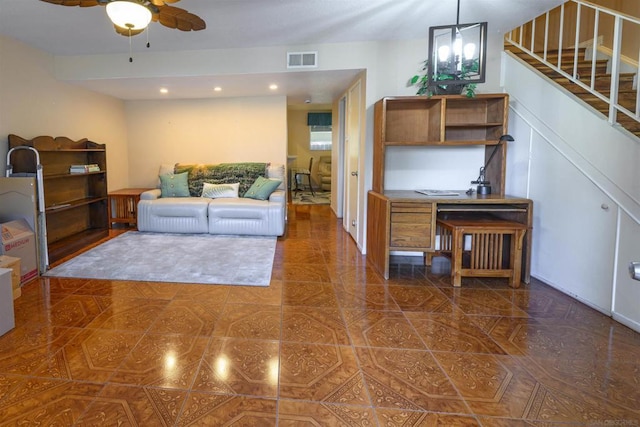 tiled living room featuring ceiling fan