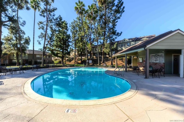 view of pool with a patio area