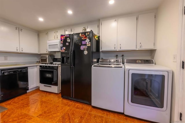 washroom featuring washer and dryer