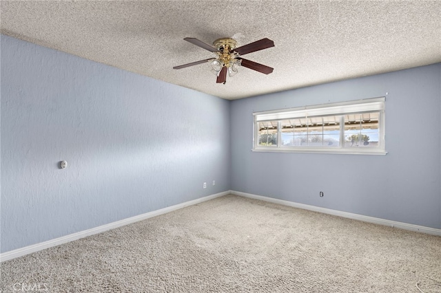 unfurnished room featuring carpet floors, a textured ceiling, and ceiling fan