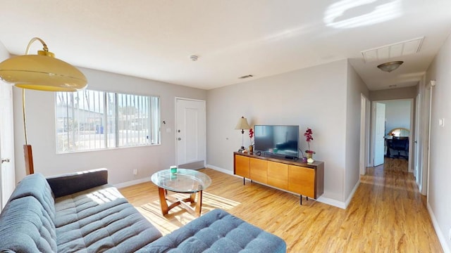 living room with hardwood / wood-style flooring