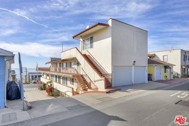 view of property exterior featuring a garage