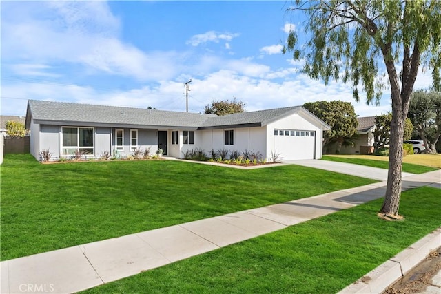 single story home with a front yard and a garage