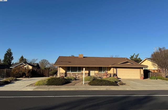 ranch-style house with a garage