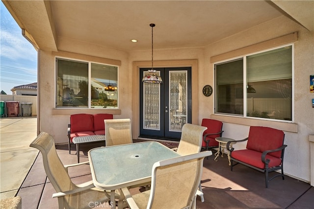 view of patio featuring french doors