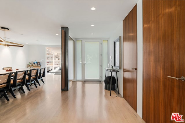 corridor featuring light hardwood / wood-style flooring