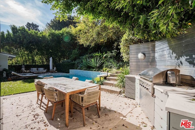 view of patio featuring area for grilling