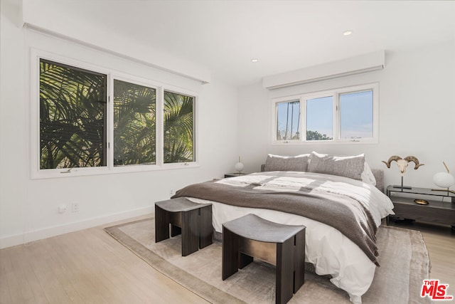 bedroom featuring light wood-type flooring