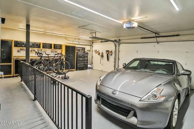 garage featuring a garage door opener