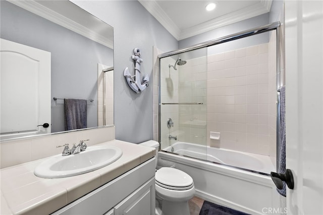 full bathroom with toilet, vanity, crown molding, and combined bath / shower with glass door