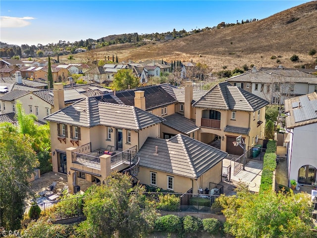 drone / aerial view featuring a mountain view