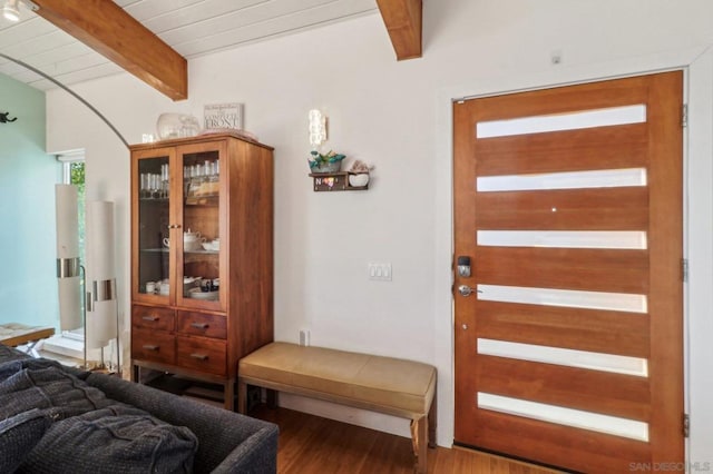 entryway with beamed ceiling, wood ceiling, and hardwood / wood-style flooring