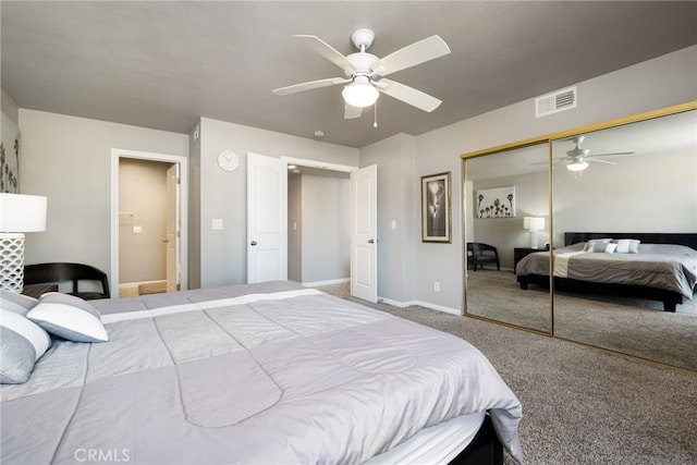 bedroom featuring ceiling fan, a closet, and carpet floors