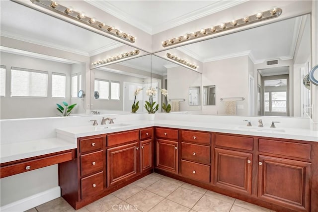 bathroom with vanity, ornamental molding, and tile patterned floors