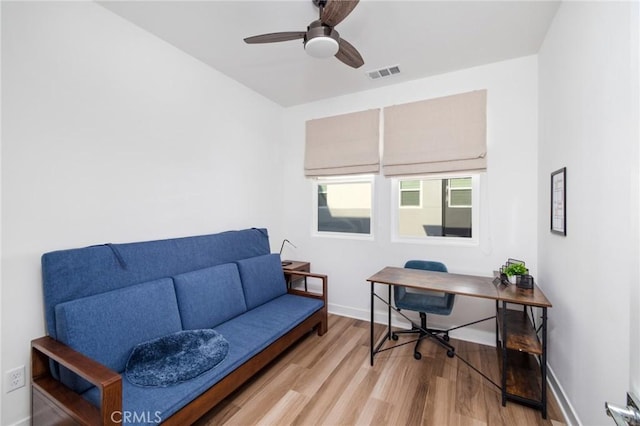 office featuring ceiling fan and light wood-type flooring