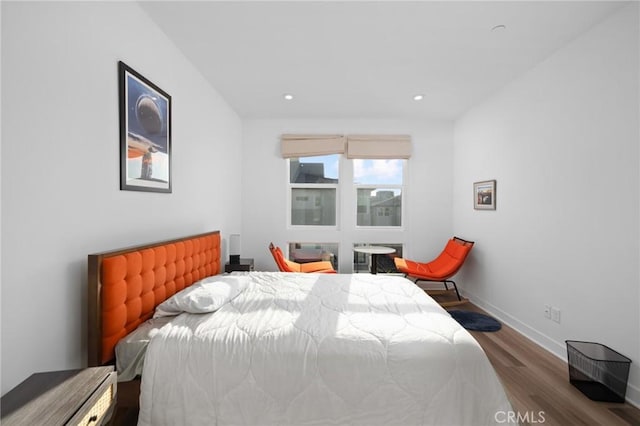 bedroom featuring wood-type flooring