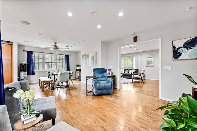 431 Preciado St, Pomona, CA 91768 - living room with light wood-style floors, recessed lighting, plenty of natural light, and baseboards